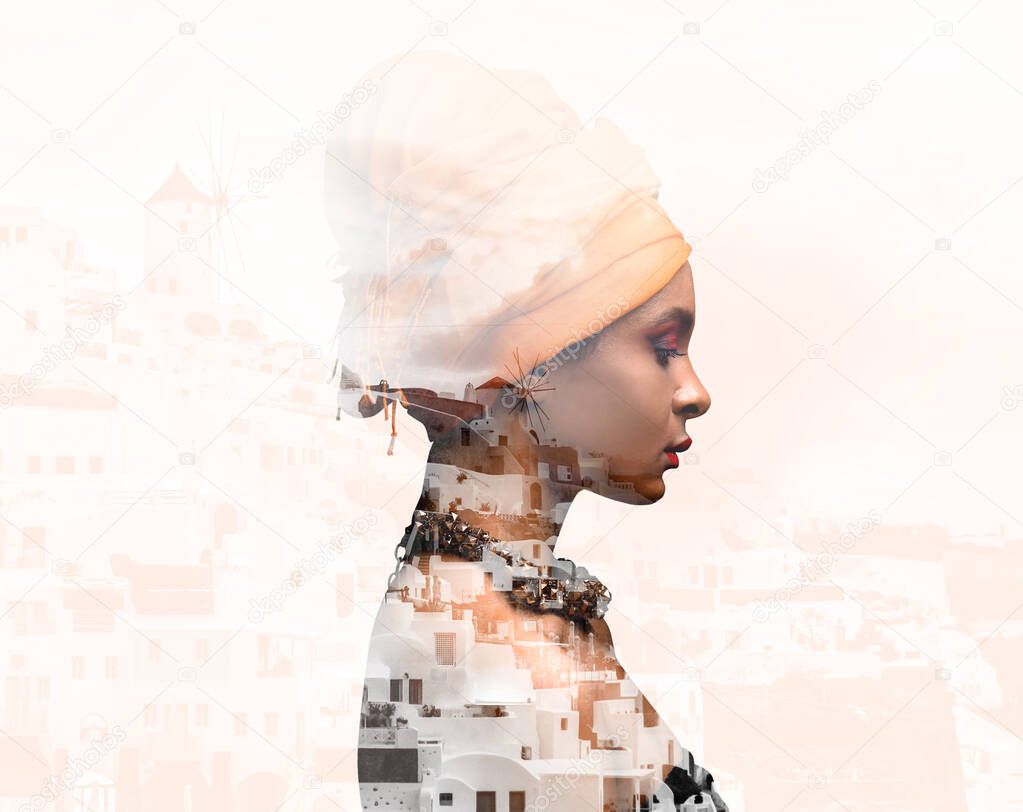 Double exposure of young African-American woman and old city