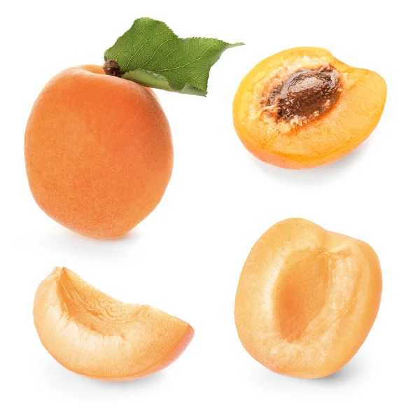 Tasty ripe apricots on white background — Stock Photo, Image