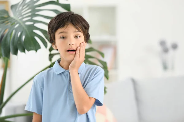 Surprised little boy at home — Stock Photo, Image
