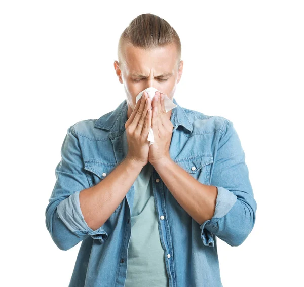 Young man suffering from allergy on white background — Stock Photo, Image