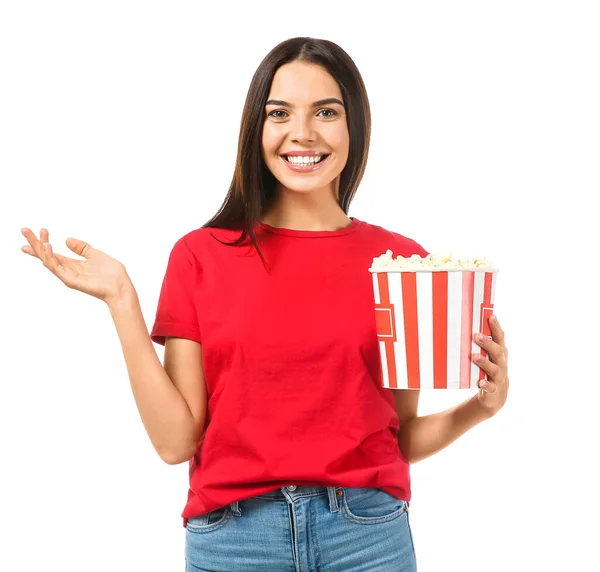 Young woman with popcorn on white background — Stock Photo, Image