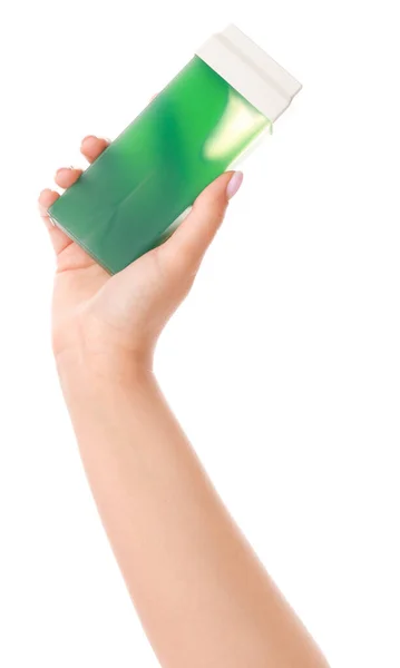Female hand with liposoluble wax cartridge for epilation on white background — Stock Photo, Image