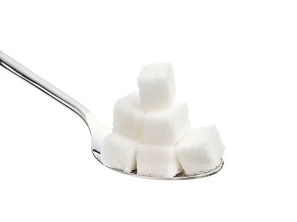 Spoon with sugar on white background — Stock Photo, Image