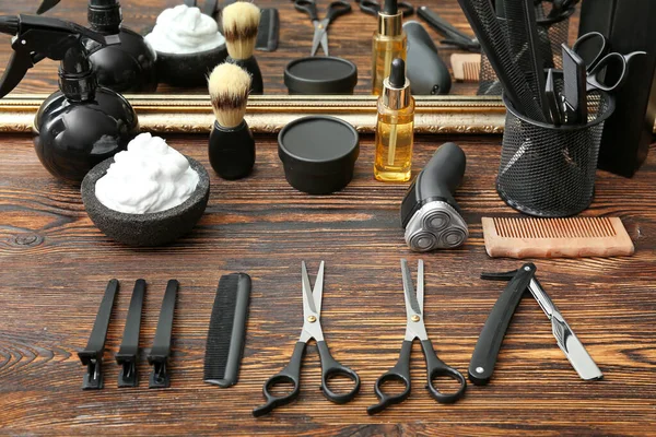 Professional barber's tools on table in salon