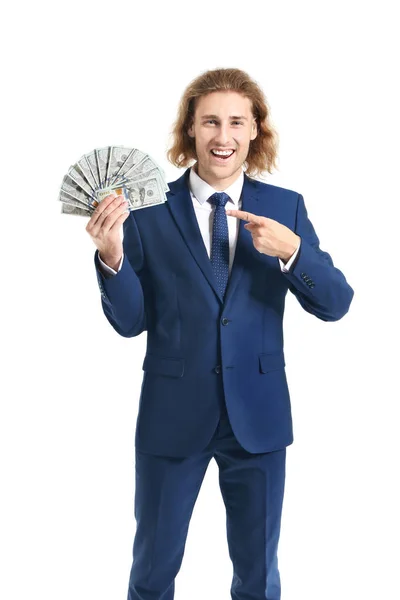 Bonito jovem empresário com dinheiro no fundo branco — Fotografia de Stock