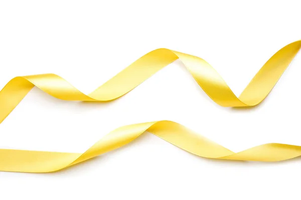 Beautiful golden ribbons on white background — Stock Photo, Image