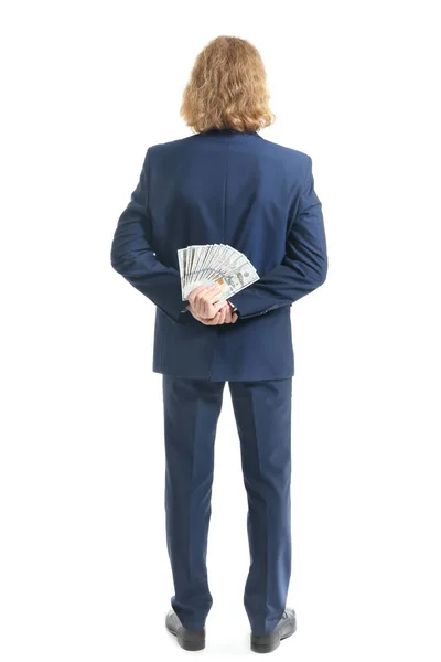 Guapo joven hombre de negocios con dinero sobre fondo blanco, vista trasera — Foto de Stock