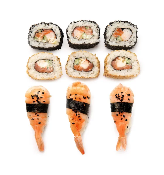 Composizione con sushi diverso su fondo bianco — Foto Stock