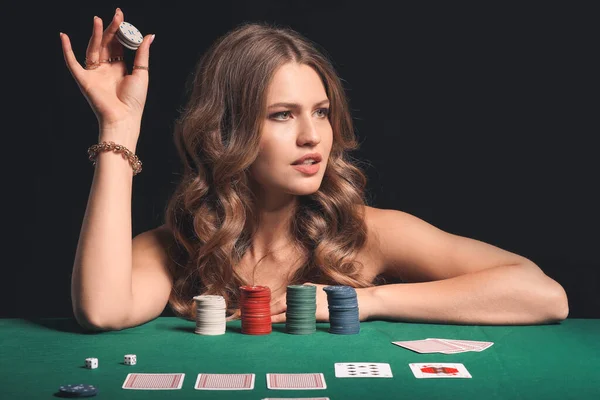 Female poker player at table in casino — Stock Photo, Image