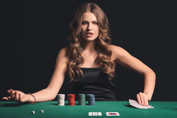 Female poker player at table in casino — Stock Photo, Image