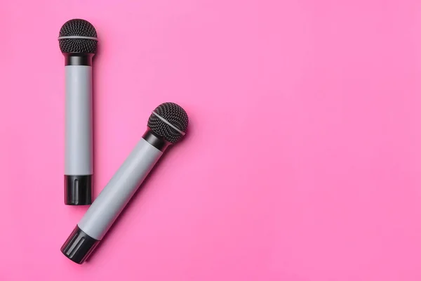 Modern microphones on color background — Stock Photo, Image