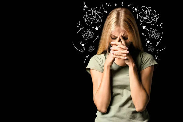 Stressed young woman on dark background — Stock Photo, Image