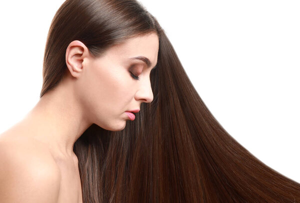 Beautiful woman with healthy long hair on white background