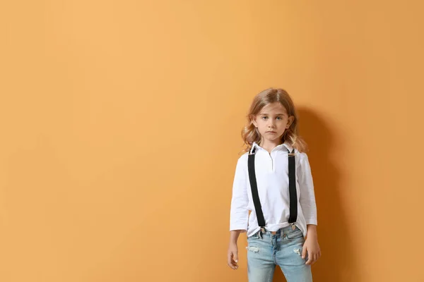 Stylish little girl on color background — Stock Photo, Image