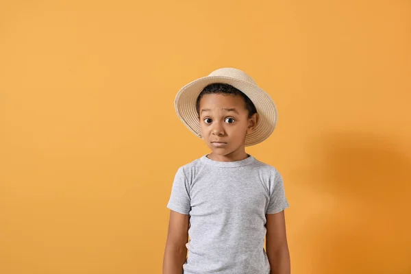 Surprised African-American boy on color background — Stock Photo, Image