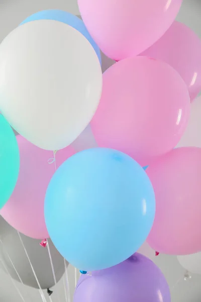 Air balloons on light background, closeup — Stock Photo, Image