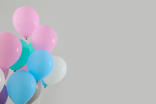 Air balloons on light background — Stock Photo, Image