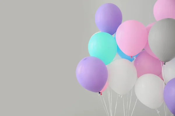 Air balloons on light background — Stock Photo, Image