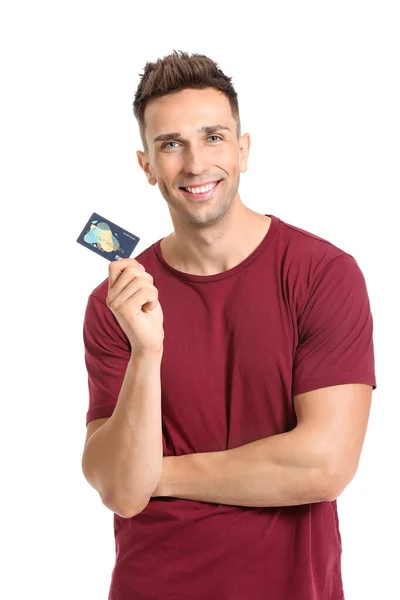 Young man with credit card on white background — Stock Photo, Image