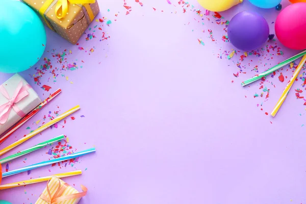Composition with balloons, gifts and place for text on color background — Stock Photo, Image
