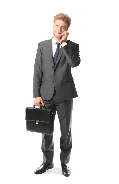 Portrait of handsome businessman talking by mobile phone on white background — Stock Photo, Image