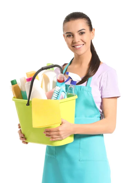 Female janitor with cleaning supplies on white background — Stock Photo, Image