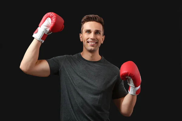 Sporty male boxer on dark background — ストック写真