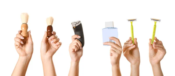 Hands with different tools for shaving on white background — Stock Photo, Image