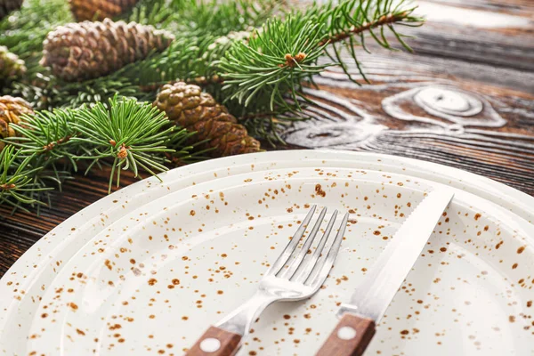 Beautiful table setting for Christmas dinner on wooden background, closeup — Stock Photo, Image
