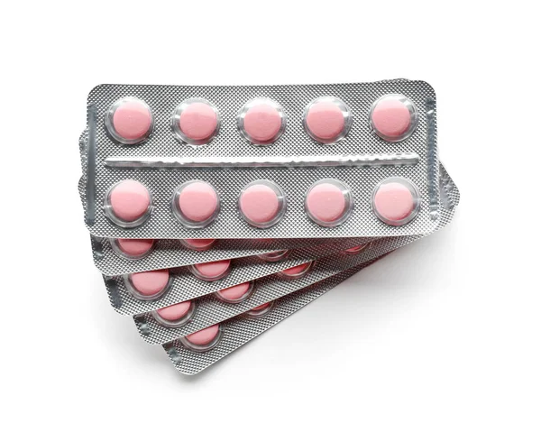 Buborékcsomagolás tablettákkal fehér alapon — Stock Fotó