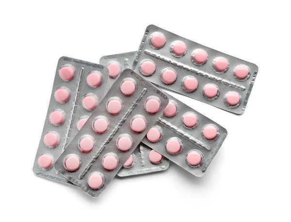 Blisterverpackungen mit Pillen auf weißem Hintergrund — Stockfoto