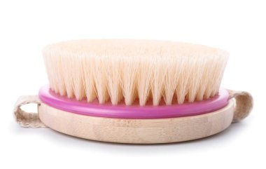 beyaz zemin üzerine masaj fırçası