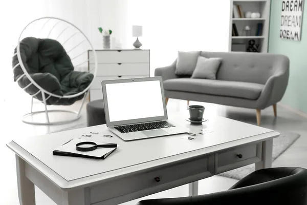 Comfortable workplace with modern laptop in room — Stock Photo, Image