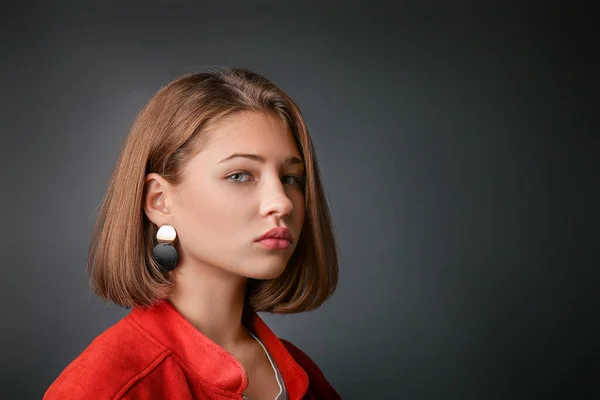 Sad teenage girl on dark background — Stock Photo, Image