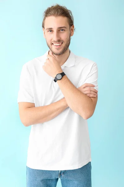 Portrait of handsome man on color background — Stock Photo, Image