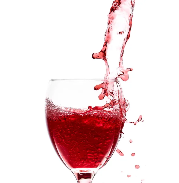 Glass of wine with splash on white background — Stock Photo, Image