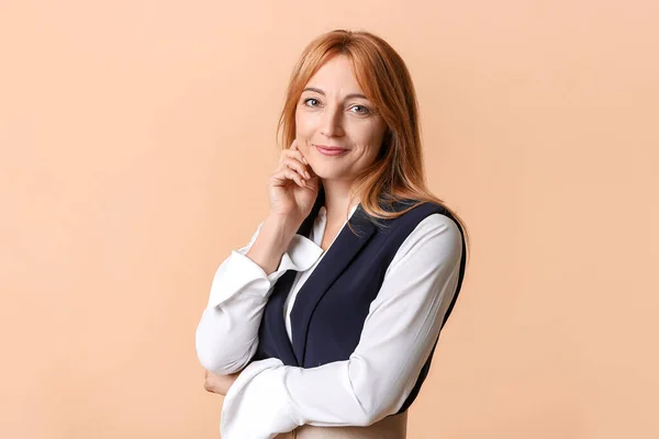 Stylish mature businesswoman on color background — Stock Photo, Image