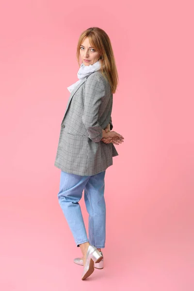 Stylish mature woman on color background — Stock Photo, Image