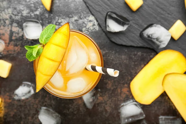 Glass of tasty mango juice on table — Stock Photo, Image