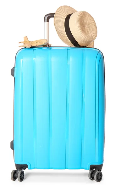 Packed suitcase, toy airplane and hat on white background. Travel concept — Stock Photo, Image