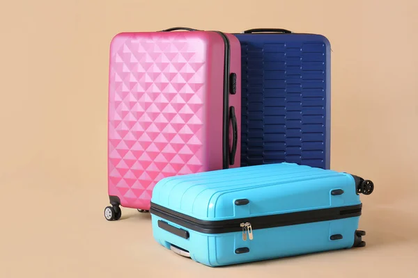 Packed suitcases on color background. Travel concept — Stock Photo, Image