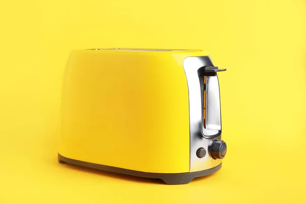 Modern toaster on color background — Stock Photo, Image