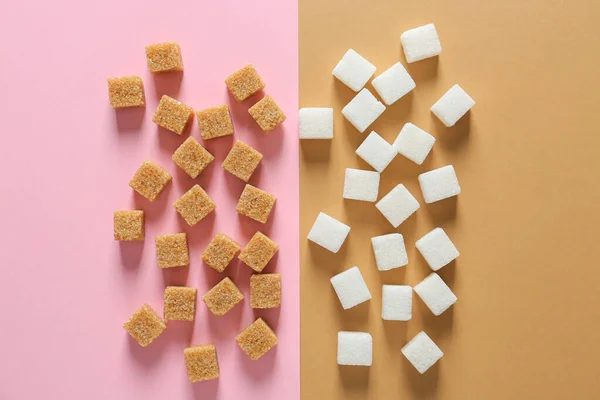 Açúcar diferente no fundo da cor — Fotografia de Stock