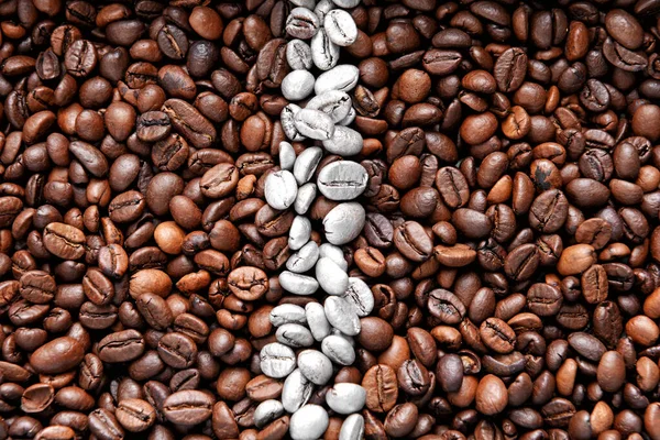 Heap of roasted and painted coffee beans — Stock Photo, Image