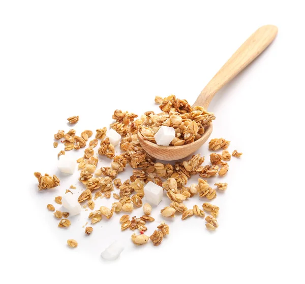 Spoon with tasty granola on white background — Stock Photo, Image