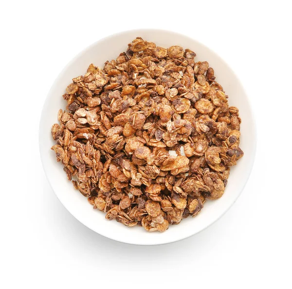Placa com granola saborosa no fundo branco — Fotografia de Stock