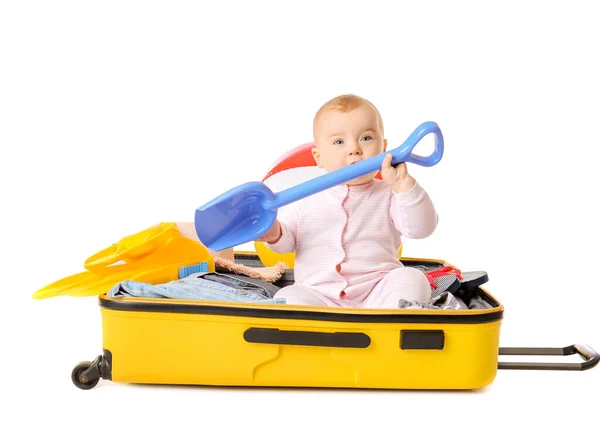 Cute baby with suitcase and belongings on white background Royalty Free Stock Photos
