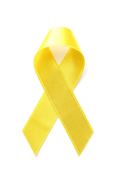 Ruban jaune sur fond blanc. Concept de sensibilisation au cancer — Photo