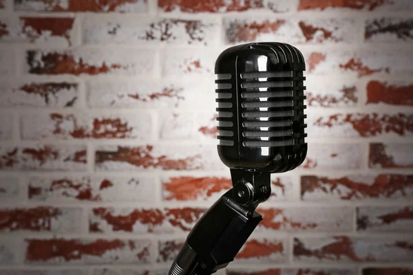 Retro microphone on brick  background — Stock Photo, Image