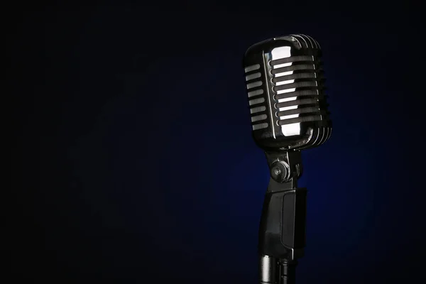 Retro microphone on dark background — Stock Photo, Image